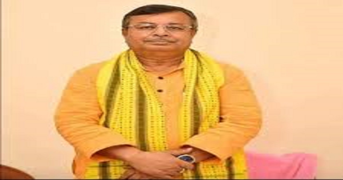 Ratan Lal Nath takes to paddy field to cut rice plants for encouraging farmers