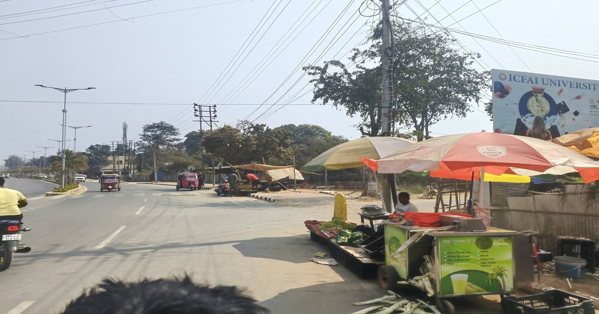 Footpath Encroachment, Waste Mismanagement Raise Concern Along Lichubagan–VIP Road Stretch in Agartala
